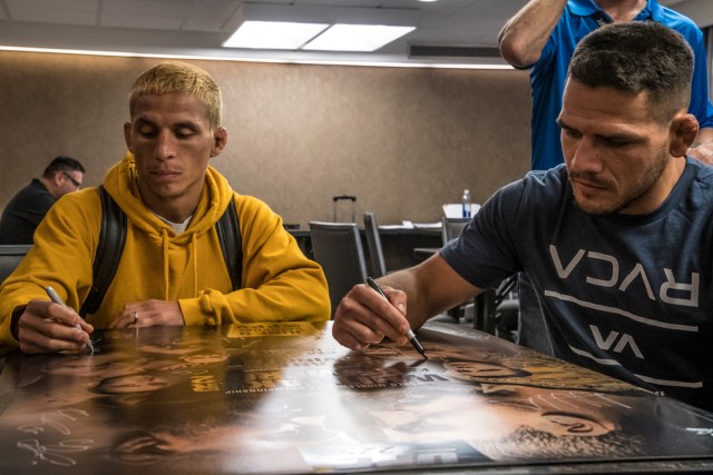 Benavidez (left) with <a href='../fighter/Rafael-Dos-Anjos'>Rafael dos Anjos</a> at UFC 225 check-ins in Chicago (Photo by Juan Cardenas/Zuffa LLC)“ align=“left“/>“I feel like with our division there has to be order,” Benavidez continues, noting that while the division may not have the star power of other weight classes, the flyweights still have plenty to offer. “We only have the skill and the next best guy, the guy with the most wins. So there’s no reason why the best two guys shouldn’t be fighting every time. I think five fights with me and Demetrious are all gonna be more exciting and more watched than a fight with him and some of the fighters he’s been against. When you think of the flyweight division, you think of Demetrious and you think of me. We’re the ones that started it and I think we’re the most notable ones in the division.”</p><p>He may be right, but first there’s Pettis, one of those aforementioned rising stars who, at 24, is still getting better. Benavidez, who will celebrate his 34th birthday next month, is more of a finished product, and as he returns, he knows he’s the veteran with the experience and skill set to give anyone fits. But this time, he also brings a youthful attitude to the Octagon that he picked up as he waited to strap the gloves on again.</p><p>“This is what I’ve done for 12 years, what I’ve loved, and it was taken away from me,” he said. “So when I came back, there was nothing specific, but I just missed it. And I’m a veteran in the sport, but I feel like a kid again mentally, like I’m starting over. I have the excitement of a kid but the skill, the talent and the experience of a veteran.”</p><p>And he’s still got his eyes set on that belt. Mr. Johnson, are you ready? Mr. Benavidez is.</p><p>“I think it’s about that time,” Benavidez said. “Let’s do it. I’m the number one guy, and I’m ready to rock.”</p></div><footer><div class=