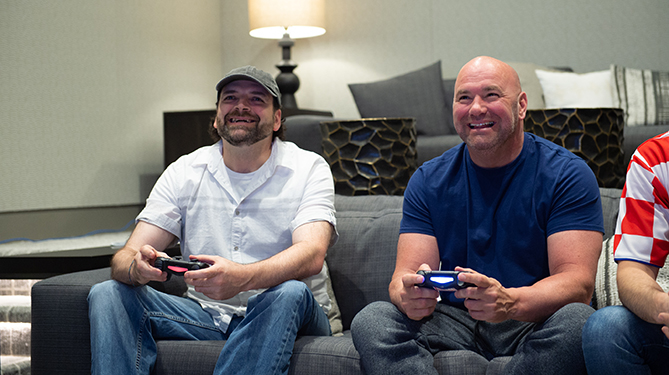 EA SPORTS UFC 3 #BeTheBoss winner John Farmer plays UFC 3 with UFC President Dana White at the UFC headquarters in Las Vegas, NV.