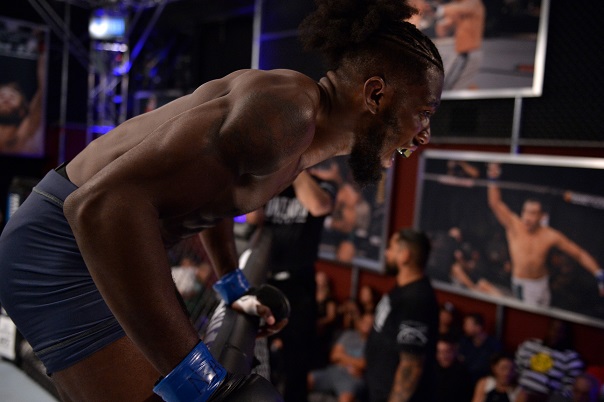 LAS VEGAS, NV - AUGUST 07: <a href='../fighter/Devonte-Smith'>Devonte Smith</a> celebrates after his knockout victory over <a href='../fighter/Joseph-Lowry'>Joseph Lowry</a> in their lightweight fight during Dana White’s Tuesday Night Contender Series at the TUF Gym on August 7, 2018 in Las Vegas, Nevada. (Photo by Chris Unger/DWTNCS LLC)“ align=“center“/><br />It’s a week after Devonte Smith became a UFC fighter, and he’s finally getting a little downtime to play Fortnite with his niece and relax. For now. But not for long.<p>“I think a flaw of mine is that I tend to look towards the next thing,” Smith said. “My mom was actually talking to me and trying to teach me to enjoy the process and enjoy the work. I tend to go, ‘All right, cool, I won, that was a good feeling. Now time for the next one.’ (Laughs) I’m always pushing forward and I want the next opponent. And I’m real big into manifestation, so after I got that win, it really felt like I was gonna get it. There was no doubt in my mind I was gonna win and get that contract. It’s like I’ve been there already because I think about it all the time.”</p><p>It took Smith less than three minutes to remove Joe Lowry from the ranks of the unbeaten on the August 7 edition of Dana White’s Tuesday Night Contender Series and join the UFC’s lightweight roster, but the journey started long before that night in Las Vegas.</p><p>“It only took me 11 years, but finally, I made it,” he laughs. “It was a great feeling all around, and I’m still feeling good about it.”</p><p>He should, because getting this contract not only means he gets to fight against the best of the best in the Octagon, but he gets the security he fought hard to get. How hard? Here’s an excerpt from his bio form in which he describes his previous job:</p><p>“I was a CDL (Commercial Driver’s License) holder, so I drove semi trucks that carried construction material around Ohio, but I had to take the material off the truck manually. I carried dry wall, mud, steel, ceiling tiles, concrete, etc. up and down stairs. Then after a 10-12 hour shift I would go to practice.”</p></div><div readability=