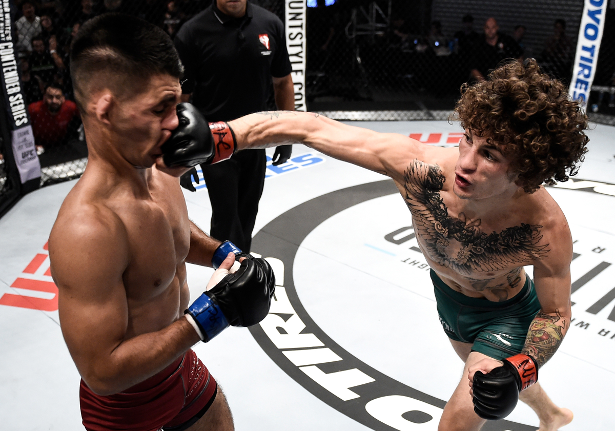 LAS VEGAS, NV - JULY 18: (R-L) Sean O'Malley punches Alfred Khashakyan in their bantamweight bout during Dana White's Tuesday Night Contender Series at the TUF Gym on July 18, 2017 in Las Vegas, Nevada. (Photo by Brandon Magnus/DWTNCS)