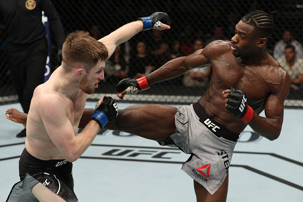 ATLANTIC CITY, NJ - APRIL 21: (R-L) Aljamain Sterling kicks Brett Johns of Wales in their bantamweight fight during the UFC Fight Night event at the Boardwalk Hall on April 21, 2018 in Atlantic City, New Jersey. (Photo by Patrick Smith/Zuffa LLC/Zuffa LLC via Getty Images)