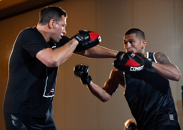 VANCOUVER, BC - AUGUST 25: (R-L) <a href='../fighter/Anthony-Pettis'>Anthony Pettis</a> spars with coach Duke Roufus during an open workout session for media and fans at the Hyatt Regency Vancouver on August 25, 2016 in Vancouver, Canada. (Photo by Jeff Bottari/Zuffa LLC/Zuffa LLC via Getty Images)“ align=“center“/><br />The text on Sunday morning meant everything to Duke Roufus. He knew he did the right thing the night before when he didn’t let Anthony Pettis out for the third round of a UFC 229 fight against <a href=