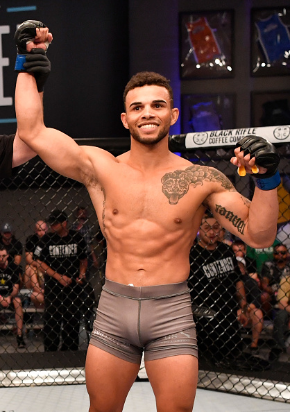 LAS VEGAS, NV - JUNE 26: Te Edwards celebrates after knocking out Austin Tweedy in their lightweight bout during Dana White's Tuesday Night Contender Series at the TUF Gym on June 26, 2018 in Las Vegas, Nevada. (Photo by Jeff Bottari/DWTNCS LLC)