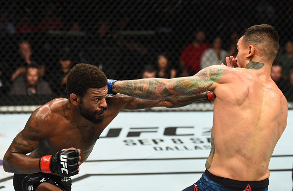 LINCOLN, NE - AUGUST 25: (L-R) <a href='../fighter/Michael-Johnson'>Michael Johnson</a> punches <a href='../fighter/Andre-Fili'>Andre Fili</a> in their lightweight fight during the <a href='../event/UFC-Silva-vs-Irvin'>UFC Fight Night </a>event at Pinnacle Bank Arena on August 25, 2018 in Lincoln, Nebraska. (Photo by Josh Hedges/Zuffa LLC/Zuffa LLC via Getty Images)“ align=“center““/>Styles make fights. So when Michael Johnson heard that <a href=