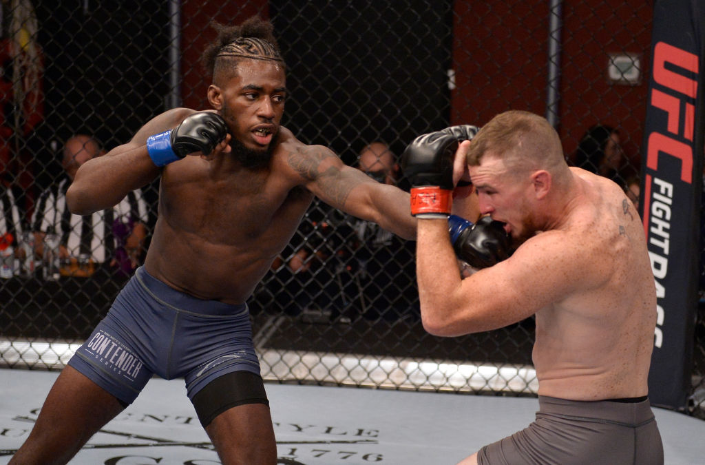 LAS VEGAS, NV - AUGUST 07: (L-R) <a href='../fighter/Devonte-Smith'>Devonte Smith</a> punches <a href='../fighter/Joseph-Lowry'>Joseph Lowry</a> in their lightweight fight during Dana White’s Tuesday Night Contender Series at the TUF Gym on August 7, 2018 in Las Vegas, Nevada. (Photo by Chris Unger/DWTNCS LLC)“ align=“center“/><br />Ohio born and raised, Devonte Smith remembers his first training trip to Colorado earlier this year.<p>“When I first came out here to train, that altitude really got to me,” he said. “I know somebody who ain’t used to this type of air, it’s gonna get to them.”</p><p>Smith hopes that somebody is <a href=