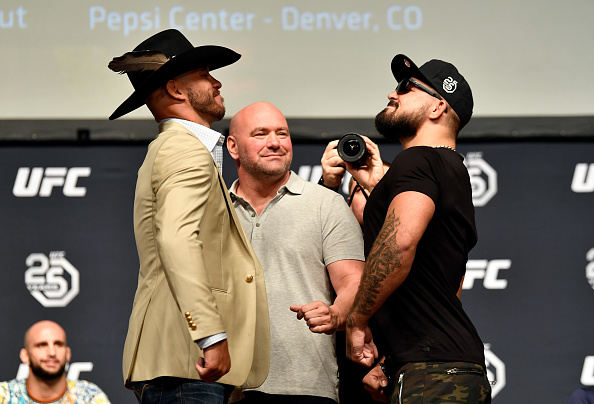 LOS ANGELES, CA - AUGUST 03: (L-R) Opponents Donald 'Cowboy' Cerrone and Mike Perry face off during the UFC press conference inside the Orpheum Theater on August 3, 2018 in Los Angeles, California. (Photo by Jeff Bottari/Zuffa LLC/Zuffa LLC via Getty Images)