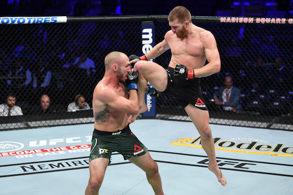 NEW YORK, NY - NOVEMBER 03: (R-L) <a href='../fighter/Matt-Frevola'>Matt Frevola</a> attempts a flying knee against <a href='../fighter/Landon-Vannata'>Lando Vannata</a> in their lightweight bout during the UFC 230 event inside Madison Square Garden on November 3, 2018 in New York, New York. (Photo by Jeff Bottari/Zuffa LLC via Getty Images)“ align=“center““/> Before the action shifted to pay-per-view, seven pairs of combatants from across the weight class spectrum stepped into the Octagon to get the crowd at Madison Square Garden keyed up for the main card.</div><p>From the heavyweight opener through the featherweight finale, the UFC 230 preliminary card fights set the tone for the festivities that would follow and featured more than a few noteworthy performances.</p><p><strong><a href=