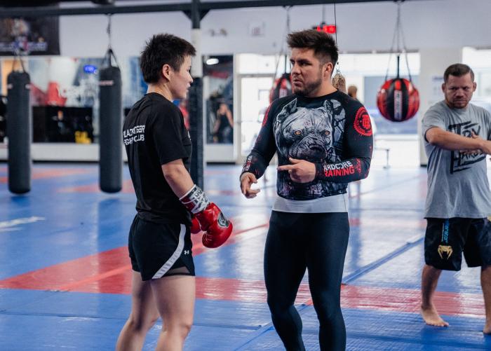 Zhang Weili trains with Henry Cejudo at Fight Ready MMA in Scottsdale, Arizona, on October 5, 2021. (Photo by Zac Pacleb)